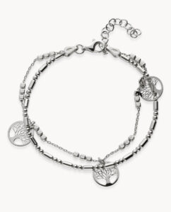 Combinación de reloj con una pulsera fina de plata para mujer